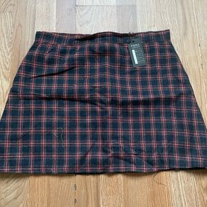 Unworn plaid skirt